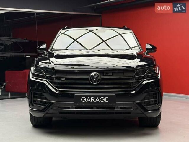 Чорний Фольксваген Туарег, об'ємом двигуна 3 л та пробігом 154 тис. км за 56900 $, фото 1 на Automoto.ua