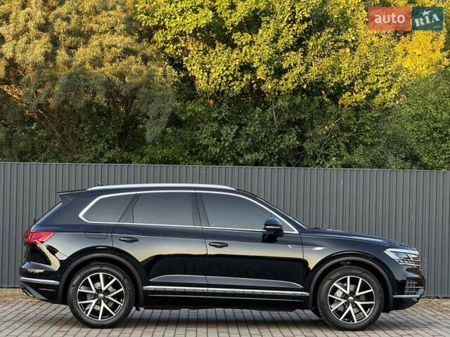 Черный Фольксваген Туарег, объемом двигателя 3 л и пробегом 142 тыс. км за 55999 $, фото 2 на Automoto.ua