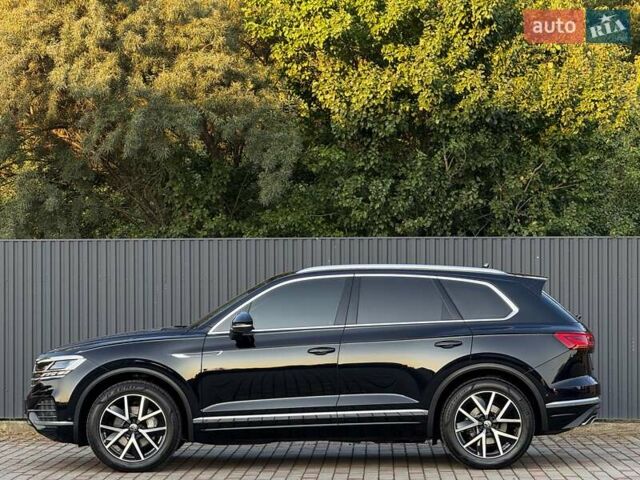 Черный Фольксваген Туарег, объемом двигателя 3 л и пробегом 142 тыс. км за 55999 $, фото 6 на Automoto.ua