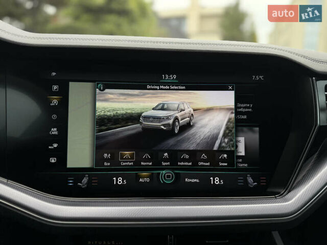 Чорний Фольксваген Туарег, об'ємом двигуна 3 л та пробігом 143 тис. км за 57900 $, фото 75 на Automoto.ua