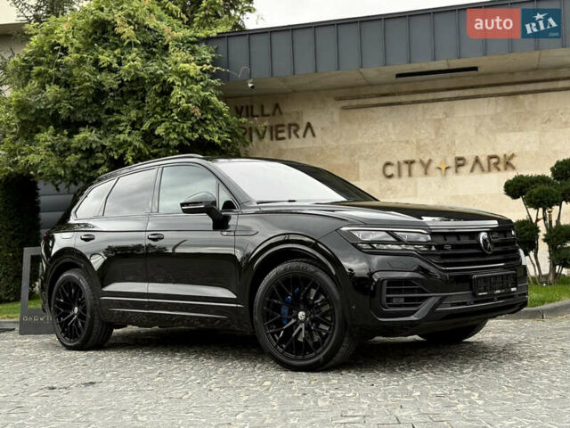 Чорний Фольксваген Туарег, об'ємом двигуна 3 л та пробігом 143 тис. км за 57900 $, фото 3 на Automoto.ua