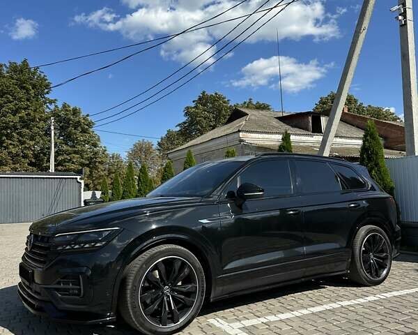 Чорний Фольксваген Туарег, об'ємом двигуна 3 л та пробігом 207 тис. км за 67500 $, фото 7 на Automoto.ua