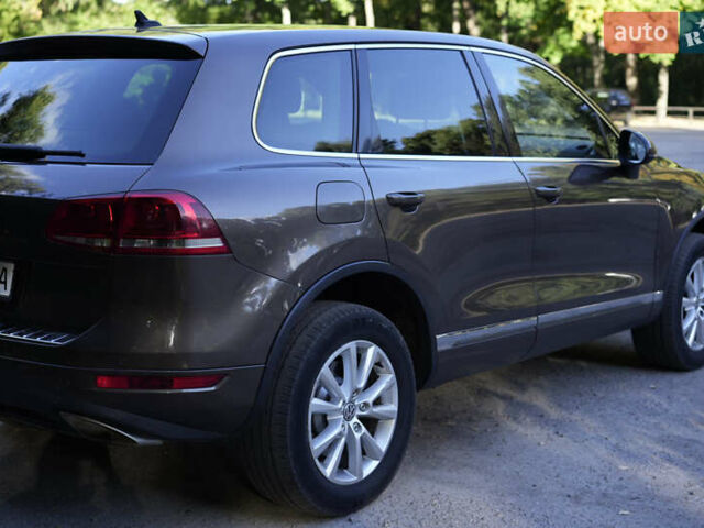 Коричневый Фольксваген Туарег, объемом двигателя 2.97 л и пробегом 304 тыс. км за 17449 $, фото 9 на Automoto.ua