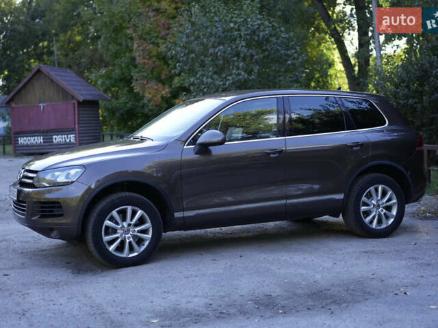 Коричневый Фольксваген Туарег, объемом двигателя 2.97 л и пробегом 304 тыс. км за 17449 $, фото 1 на Automoto.ua