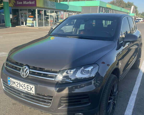 Коричневий Фольксваген Туарег, об'ємом двигуна 4.2 л та пробігом 313 тис. км за 21000 $, фото 2 на Automoto.ua