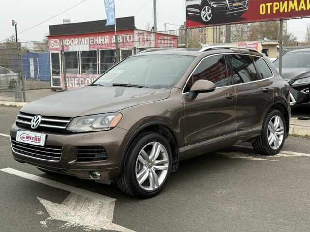 Коричневый Фольксваген Туарег, объемом двигателя 3 л и пробегом 213 тыс. км за 18000 $, фото 1 на Automoto.ua