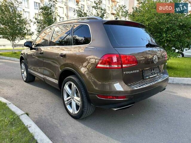 Коричневый Фольксваген Туарег, объемом двигателя 4.13 л и пробегом 294 тыс. км за 16999 $, фото 2 на Automoto.ua