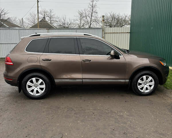 Коричневый Фольксваген Туарег, объемом двигателя 3 л и пробегом 204 тыс. км за 17400 $, фото 2 на Automoto.ua