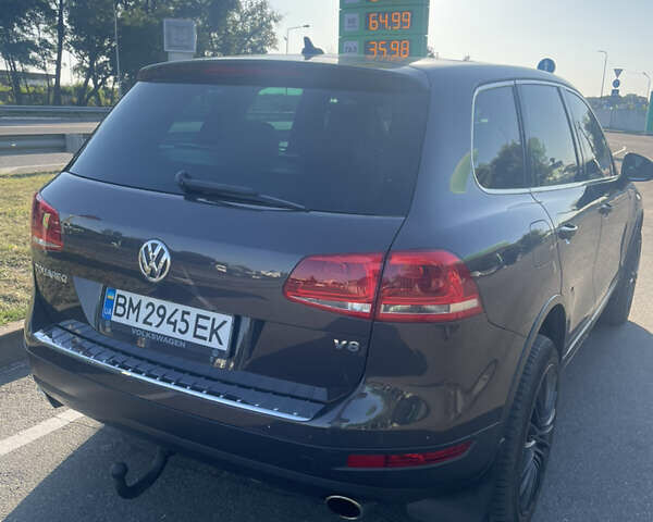 Коричневий Фольксваген Туарег, об'ємом двигуна 4.2 л та пробігом 313 тис. км за 21000 $, фото 3 на Automoto.ua