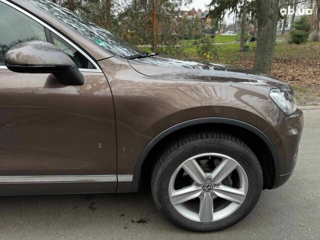 Коричневий Фольксваген Туарег, об'ємом двигуна 3 л та пробігом 296 тис. км за 19390 $, фото 4 на Automoto.ua