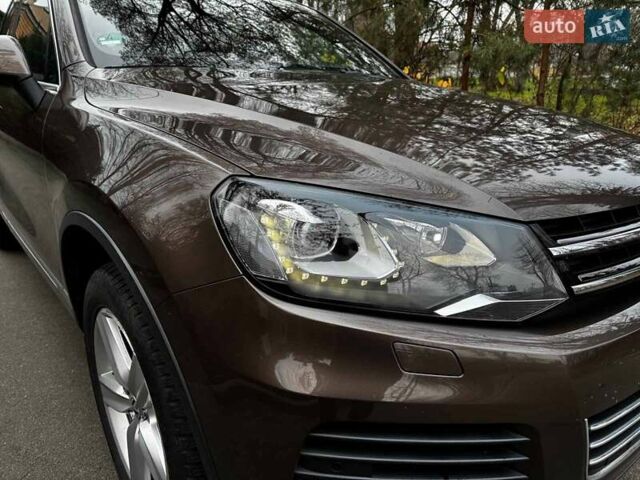 Коричневий Фольксваген Туарег, об'ємом двигуна 3 л та пробігом 296 тис. км за 19390 $, фото 2 на Automoto.ua