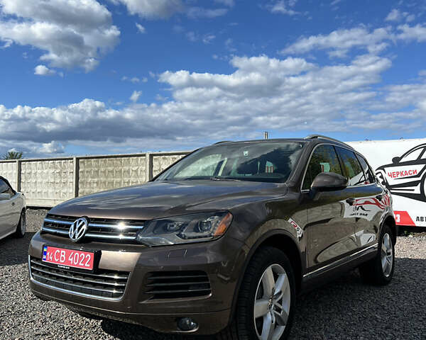 Коричневий Фольксваген Туарег, об'ємом двигуна 3 л та пробігом 251 тис. км за 20900 $, фото 2 на Automoto.ua