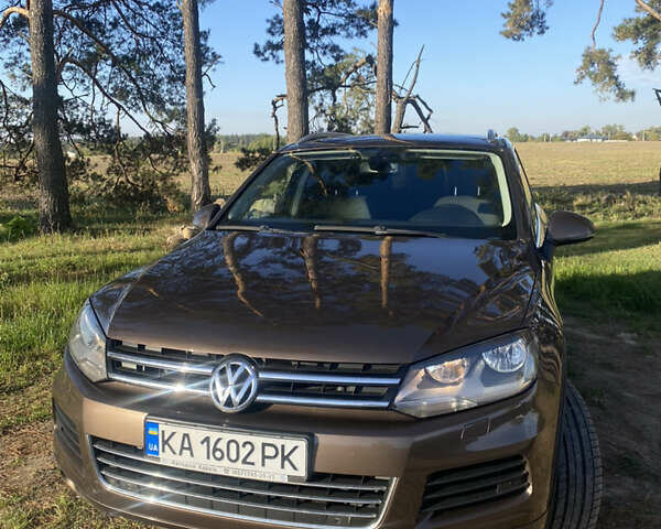 Коричневый Фольксваген Туарег, объемом двигателя 2.97 л и пробегом 174 тыс. км за 18500 $, фото 1 на Automoto.ua