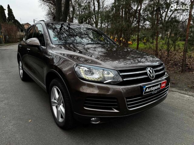 Коричневий Фольксваген Туарег, об'ємом двигуна 3 л та пробігом 296 тис. км за 19390 $, фото 2 на Automoto.ua