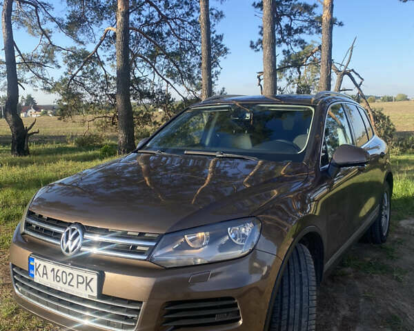 Коричневый Фольксваген Туарег, объемом двигателя 2.97 л и пробегом 174 тыс. км за 18500 $, фото 2 на Automoto.ua