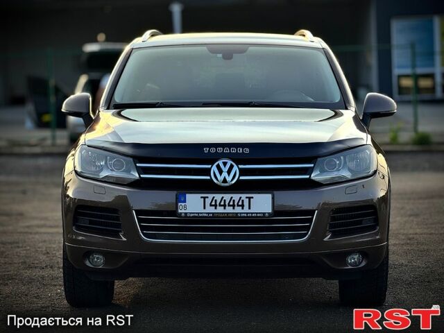 Коричневый Фольксваген Туарег, объемом двигателя 3 л и пробегом 236 тыс. км за 18000 $, фото 1 на Automoto.ua