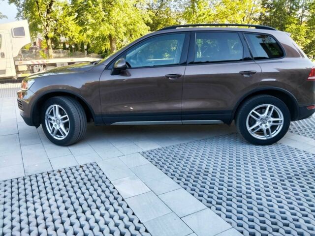 Коричневый Фольксваген Туарег, объемом двигателя 3 л и пробегом 235 тыс. км за 20998 $, фото 1 на Automoto.ua