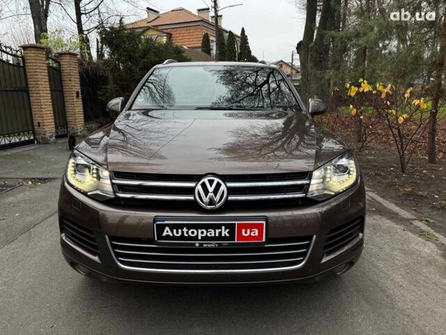 Коричневий Фольксваген Туарег, об'ємом двигуна 3 л та пробігом 296 тис. км за 19390 $, фото 1 на Automoto.ua