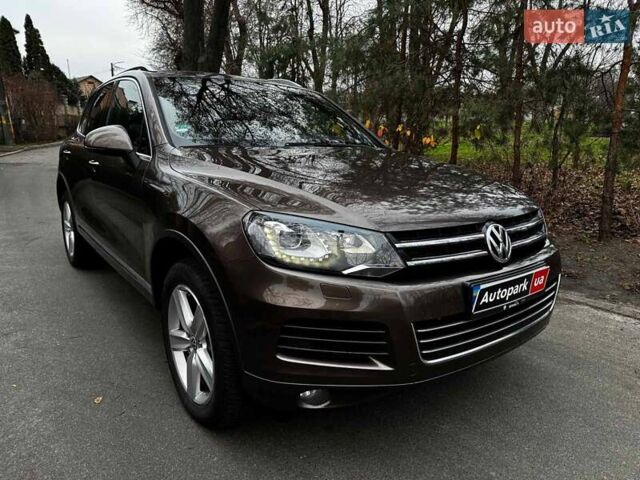 Коричневий Фольксваген Туарег, об'ємом двигуна 3 л та пробігом 296 тис. км за 19390 $, фото 3 на Automoto.ua