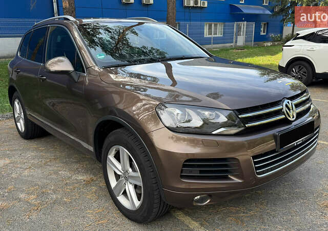Коричневый Фольксваген Туарег, объемом двигателя 3 л и пробегом 230 тыс. км за 19200 $, фото 2 на Automoto.ua