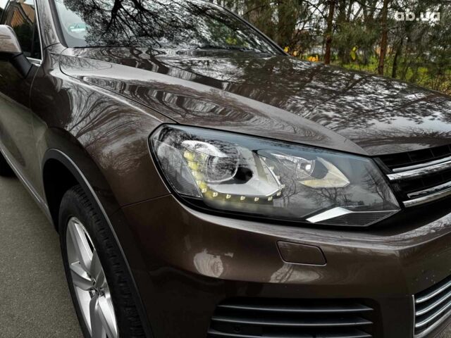 Коричневий Фольксваген Туарег, об'ємом двигуна 3 л та пробігом 296 тис. км за 19390 $, фото 3 на Automoto.ua