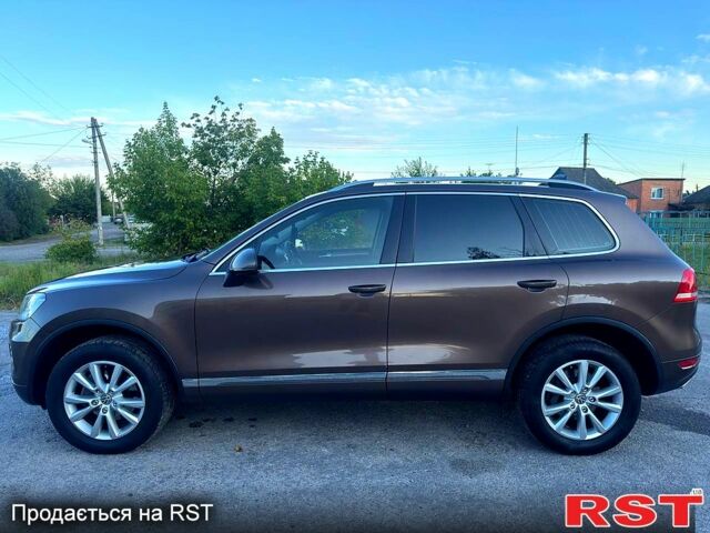 Коричневый Фольксваген Туарег, объемом двигателя 3 л и пробегом 193 тыс. км за 15499 $, фото 2 на Automoto.ua