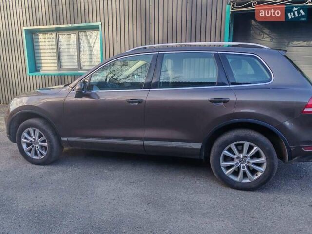 Коричневий Фольксваген Туарег, об'ємом двигуна 3 л та пробігом 319 тис. км за 14900 $, фото 19 на Automoto.ua