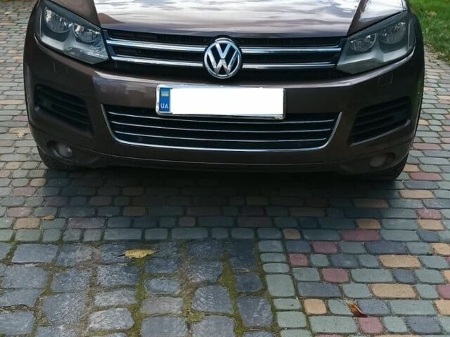 Коричневий Фольксваген Туарег, об'ємом двигуна 3 л та пробігом 321 тис. км за 14300 $, фото 1 на Automoto.ua