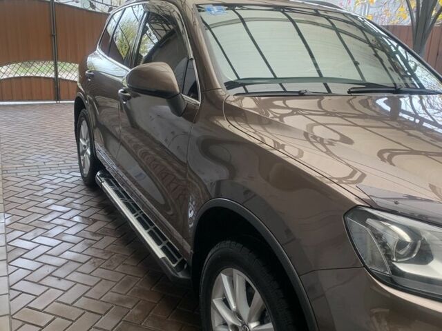 Коричневый Фольксваген Туарег, объемом двигателя 3 л и пробегом 106 тыс. км за 23000 $, фото 1 на Automoto.ua