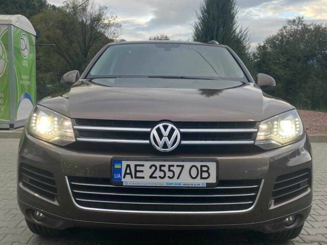 Коричневый Фольксваген Туарег, объемом двигателя 3 л и пробегом 150 тыс. км за 24950 $, фото 1 на Automoto.ua