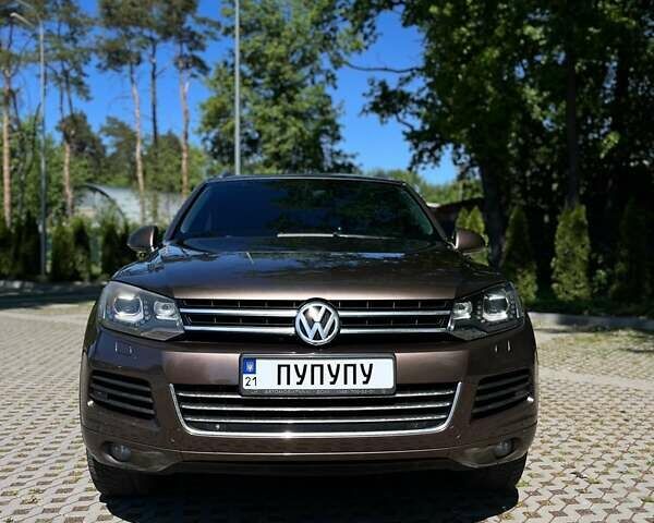 Коричневий Фольксваген Туарег, об'ємом двигуна 2.97 л та пробігом 190 тис. км за 24200 $, фото 1 на Automoto.ua