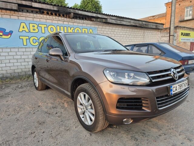 Коричневый Фольксваген Туарег, объемом двигателя 3 л и пробегом 265 тыс. км за 20000 $, фото 1 на Automoto.ua