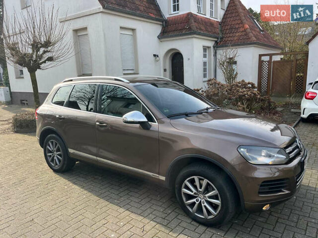 Коричневый Фольксваген Туарег, объемом двигателя 3 л и пробегом 175 тыс. км за 19000 $, фото 3 на Automoto.ua