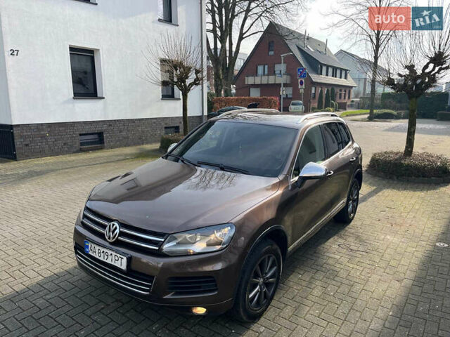 Коричневый Фольксваген Туарег, объемом двигателя 3 л и пробегом 175 тыс. км за 19000 $, фото 2 на Automoto.ua