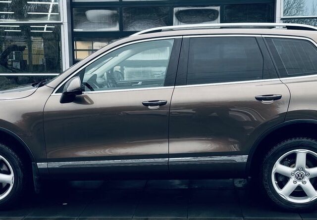 Коричневый Фольксваген Туарег, объемом двигателя 3 л и пробегом 217 тыс. км за 22000 $, фото 9 на Automoto.ua