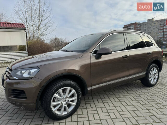 Коричневый Фольксваген Туарег, объемом двигателя 3 л и пробегом 191 тыс. км за 18000 $, фото 1 на Automoto.ua