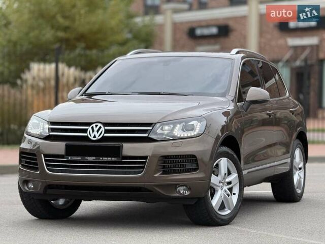 Коричневый Фольксваген Туарег, объемом двигателя 2.97 л и пробегом 144 тыс. км за 28500 $, фото 1 на Automoto.ua