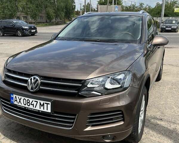Коричневий Фольксваген Туарег, об'ємом двигуна 2.97 л та пробігом 205 тис. км за 24000 $, фото 5 на Automoto.ua