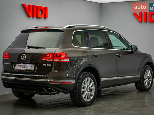 Коричневый Фольксваген Туарег, объемом двигателя 3 л и пробегом 100 тыс. км за 22796 $, фото 1 на Automoto.ua