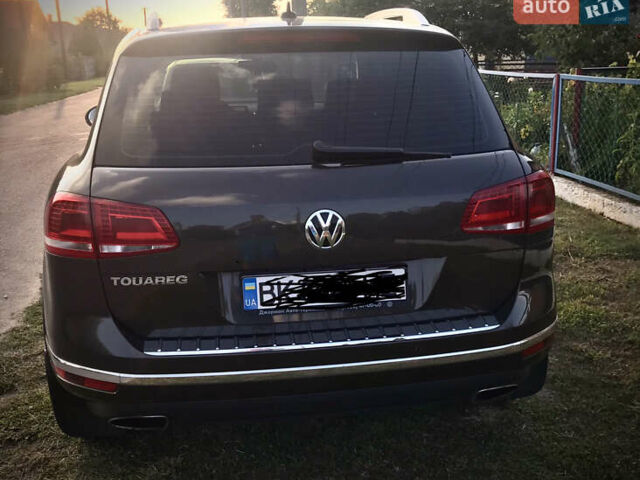 Коричневий Фольксваген Туарег, об'ємом двигуна 3 л та пробігом 255 тис. км за 29400 $, фото 2 на Automoto.ua