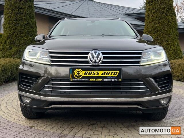 Коричневый Фольксваген Туарег, объемом двигателя 3 л и пробегом 128 тыс. км за 33800 $, фото 1 на Automoto.ua