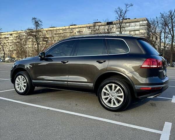 Коричневый Фольксваген Туарег, объемом двигателя 2.97 л и пробегом 155 тыс. км за 31000 $, фото 1 на Automoto.ua