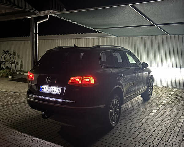 Коричневий Фольксваген Туарег, об'ємом двигуна 3 л та пробігом 154 тис. км за 33300 $, фото 2 на Automoto.ua