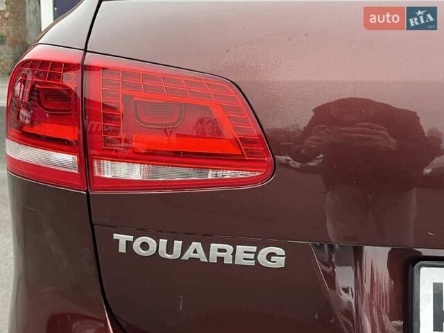 Красный Фольксваген Туарег, объемом двигателя 3.6 л и пробегом 189 тыс. км за 22649 $, фото 11 на Automoto.ua