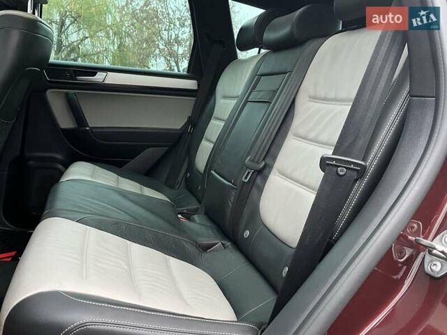 Красный Фольксваген Туарег, объемом двигателя 3.6 л и пробегом 189 тыс. км за 22649 $, фото 18 на Automoto.ua
