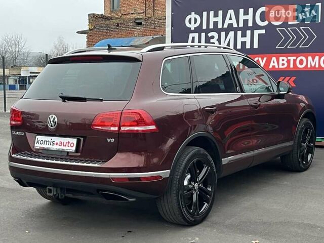 Красный Фольксваген Туарег, объемом двигателя 3.6 л и пробегом 189 тыс. км за 22649 $, фото 13 на Automoto.ua