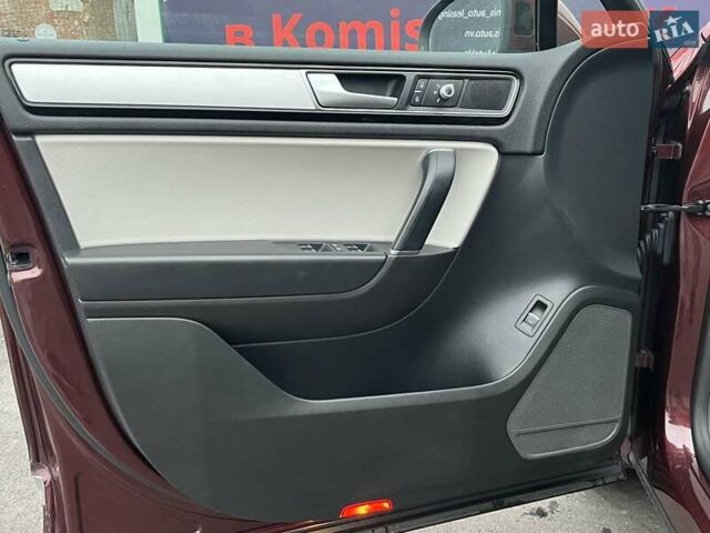 Красный Фольксваген Туарег, объемом двигателя 3.6 л и пробегом 189 тыс. км за 22649 $, фото 17 на Automoto.ua