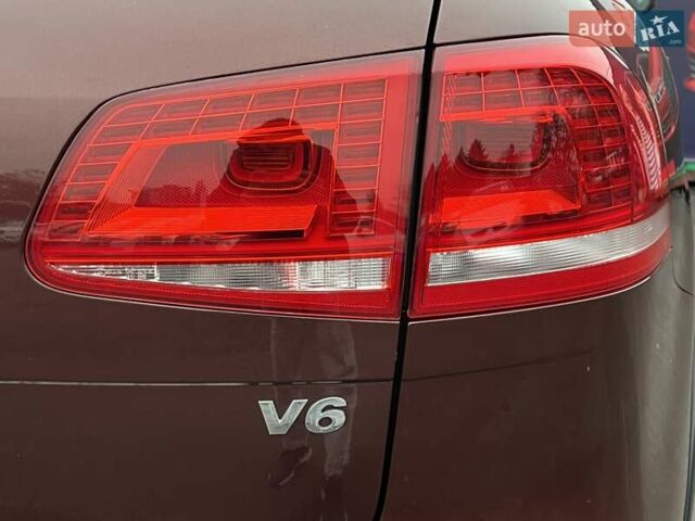 Красный Фольксваген Туарег, объемом двигателя 3.6 л и пробегом 189 тыс. км за 22649 $, фото 12 на Automoto.ua