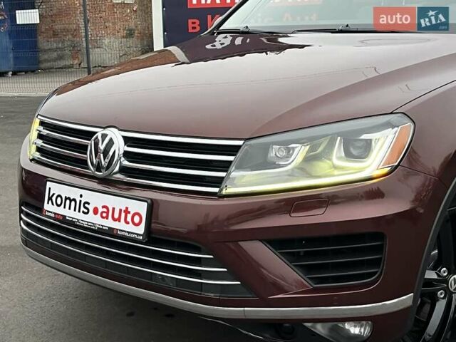 Красный Фольксваген Туарег, объемом двигателя 3.6 л и пробегом 189 тыс. км за 22649 $, фото 3 на Automoto.ua