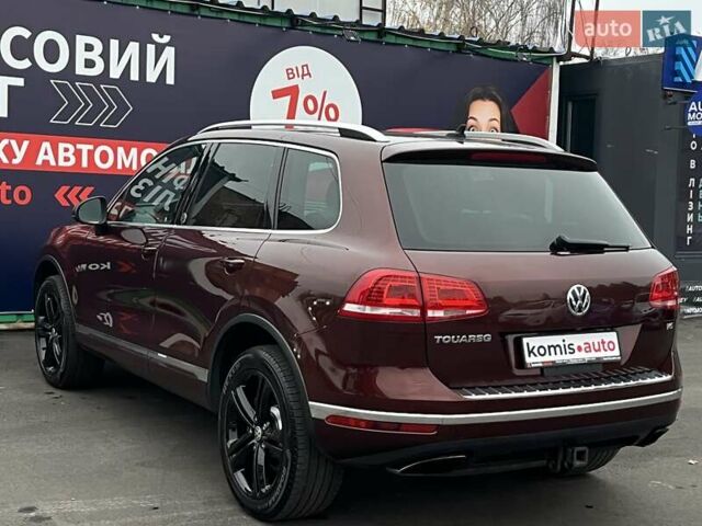 Красный Фольксваген Туарег, объемом двигателя 3.6 л и пробегом 189 тыс. км за 22649 $, фото 9 на Automoto.ua